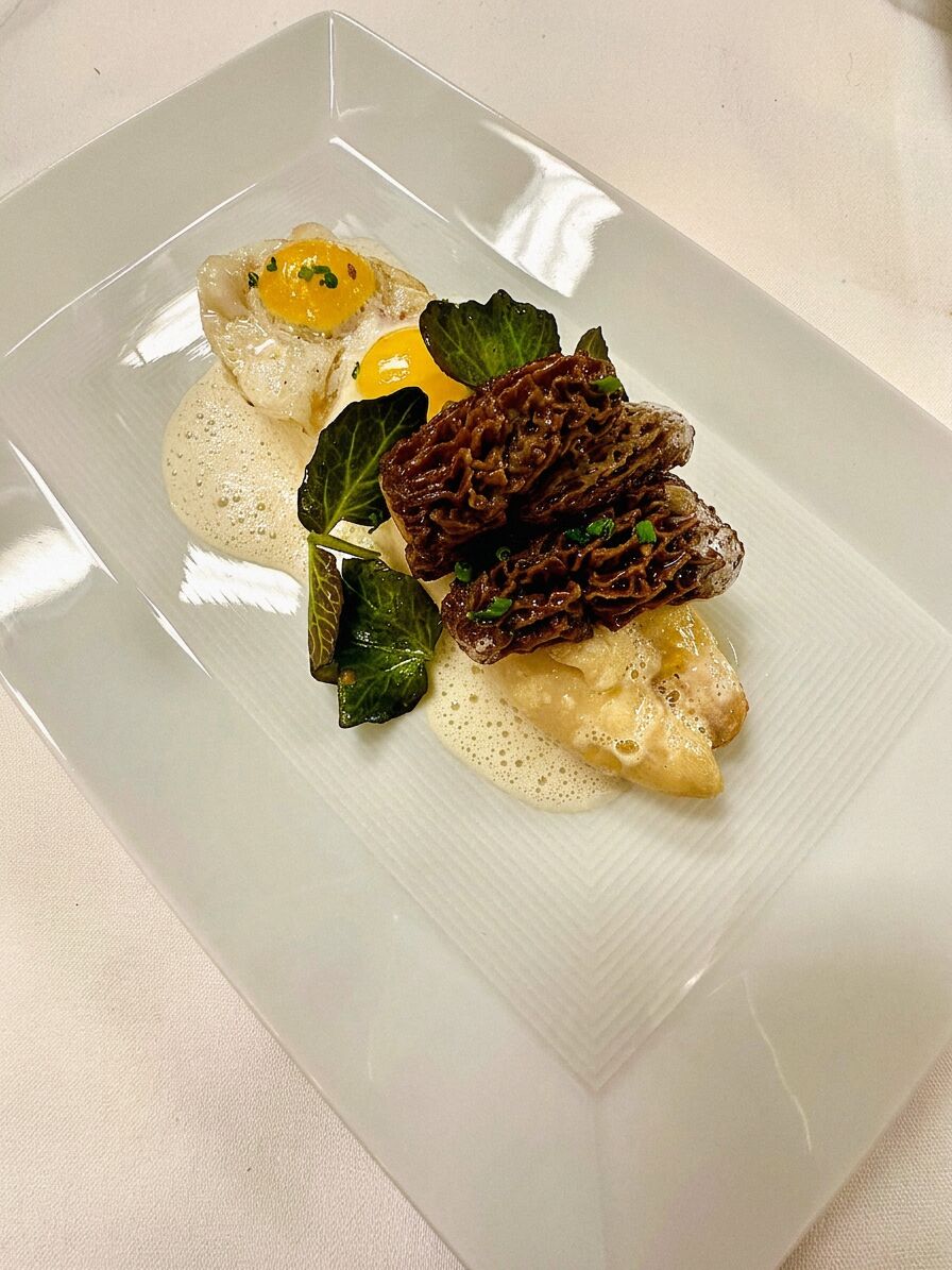 Sautéed morels with soft egg yolk and parmesan foam